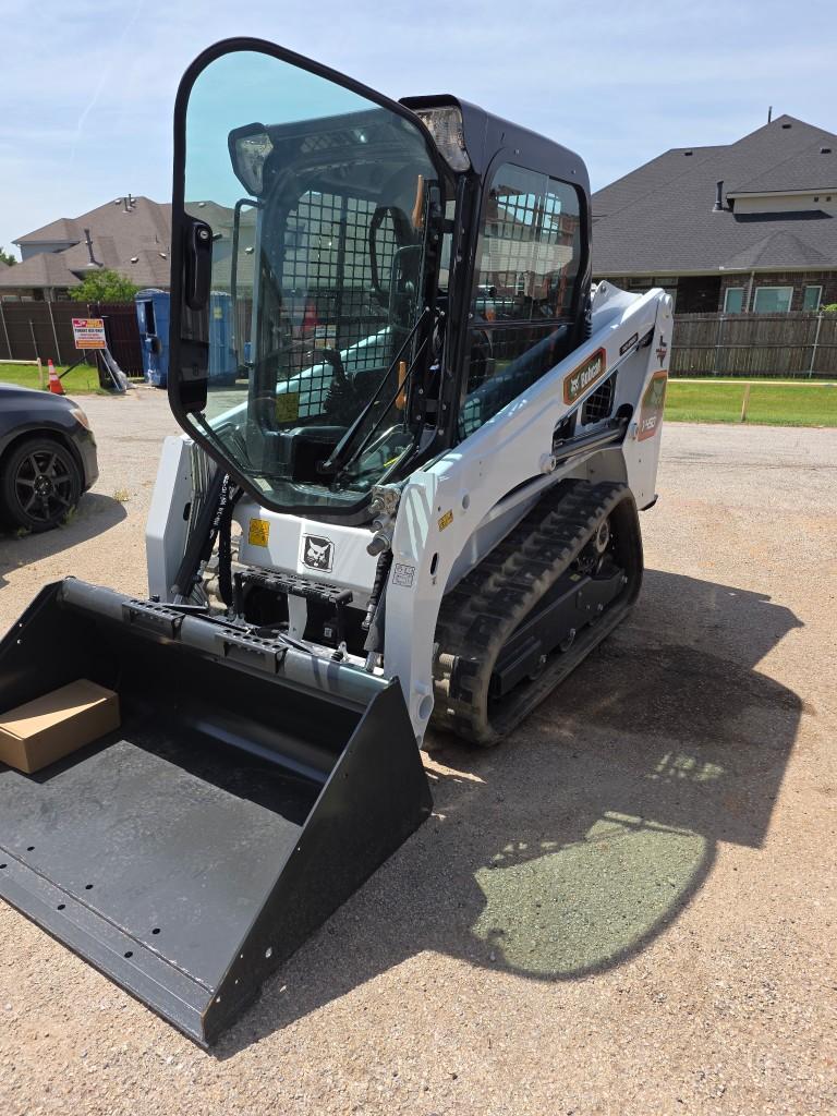 Land Leveling With a Bobcat Track Loader: Fixing Low Spots in North Texas Clay